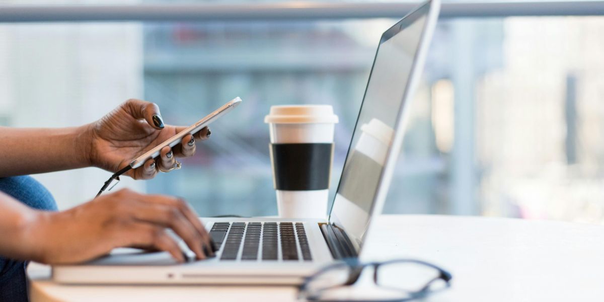 Free laptop on table top stock photo