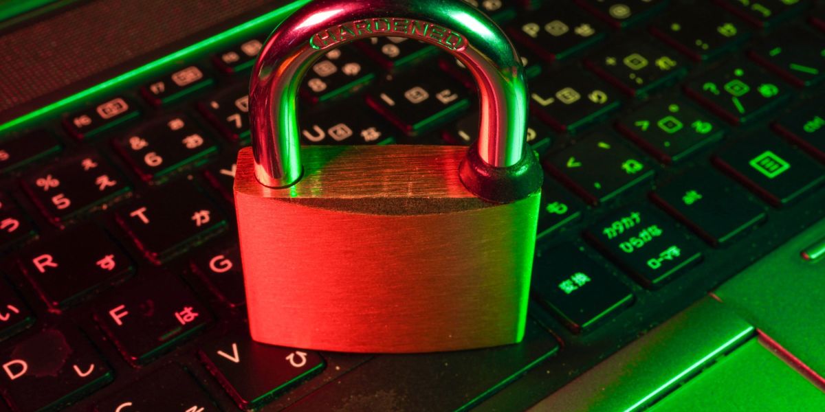 red padlock on black computer keyboard