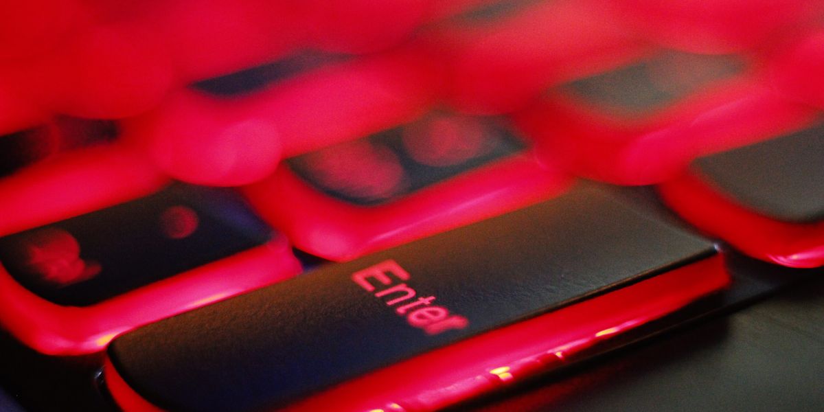 a close up of a red and black keyboard