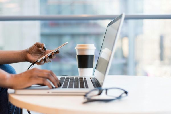 Free laptop on table top stock photo