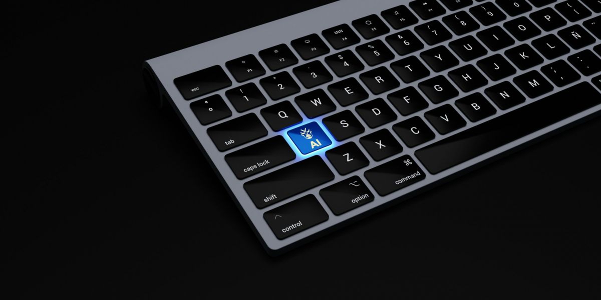 a black keyboard with a blue button on it